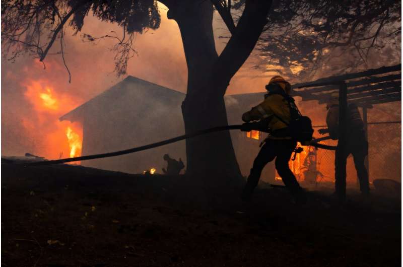 Homes burned in a matter of minutes as erratic flames jumped from one area to another, fanned by high winds. Homes burned in a matter of minutes as erratic flames jumped from one area to another, fanned by high winds